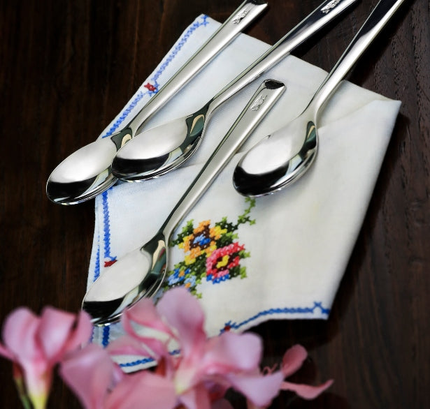Opinel Perpetue teaspoons with pink flowers and a french linen napkin perfect for tea