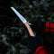 No.18 Saw blade outdoors and a wood craftsman companion.