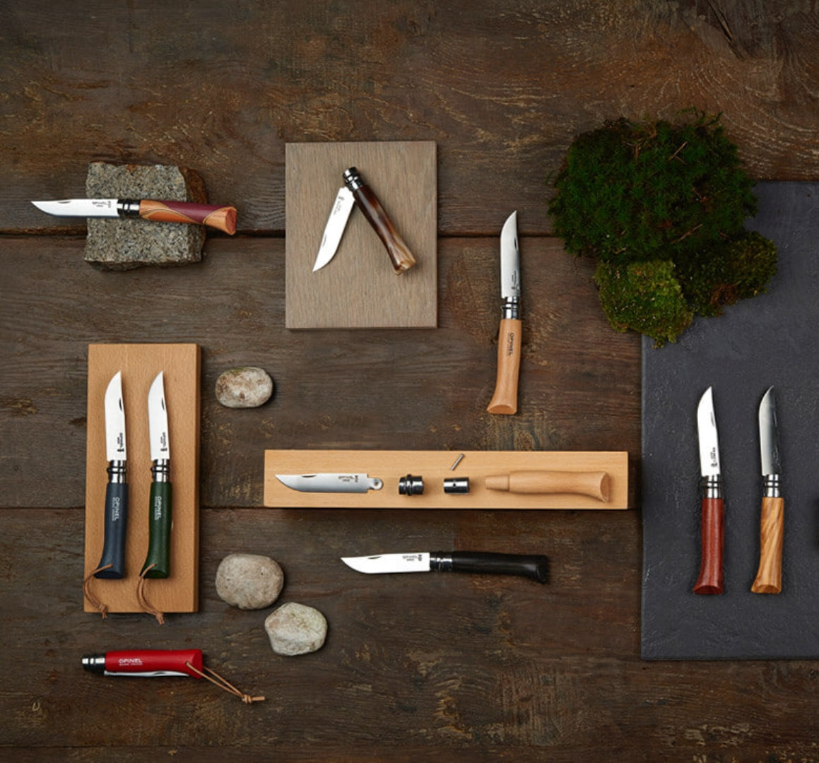 Image of Opinel overlay of display of different knives. 